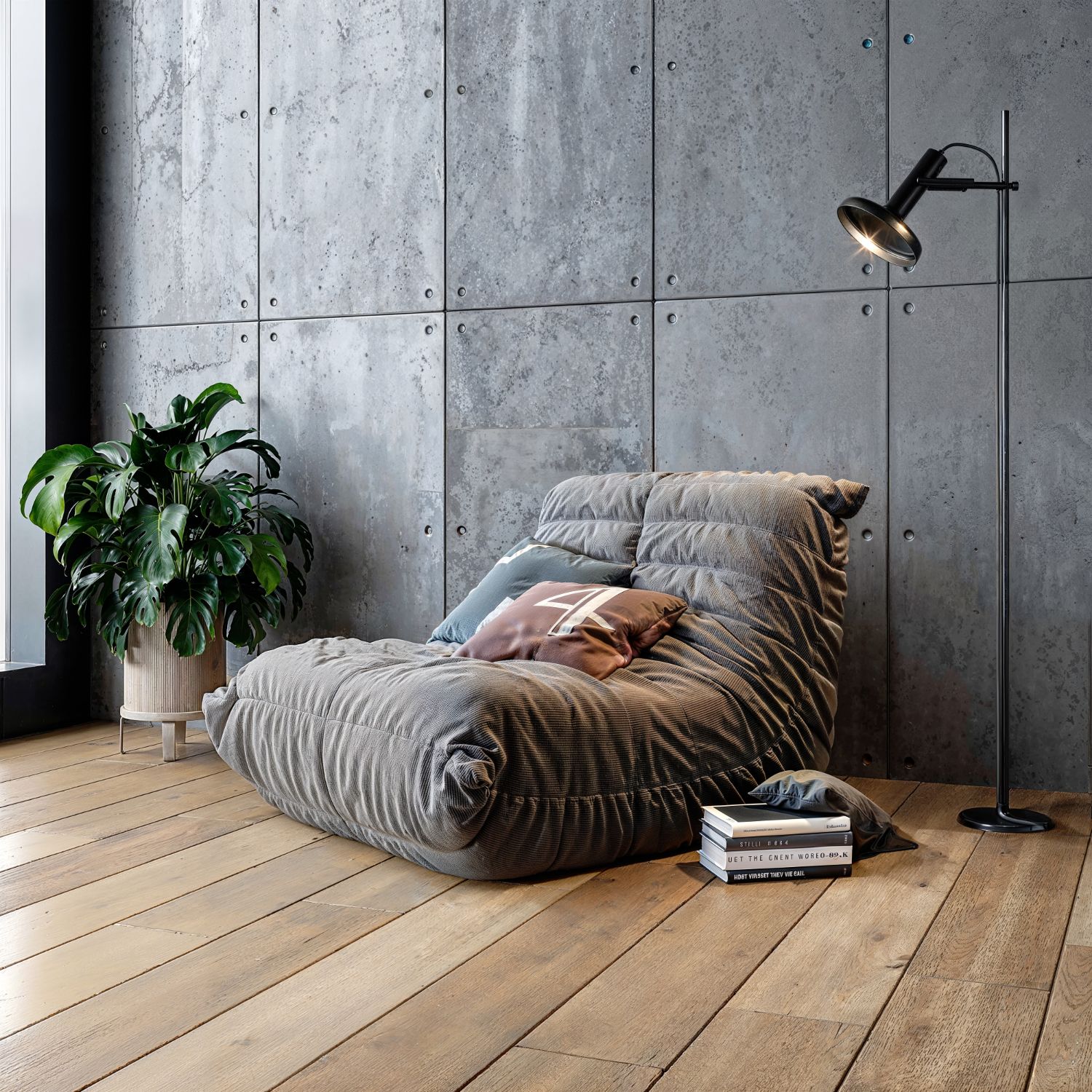 Di Capri — painel de concreto em sala
